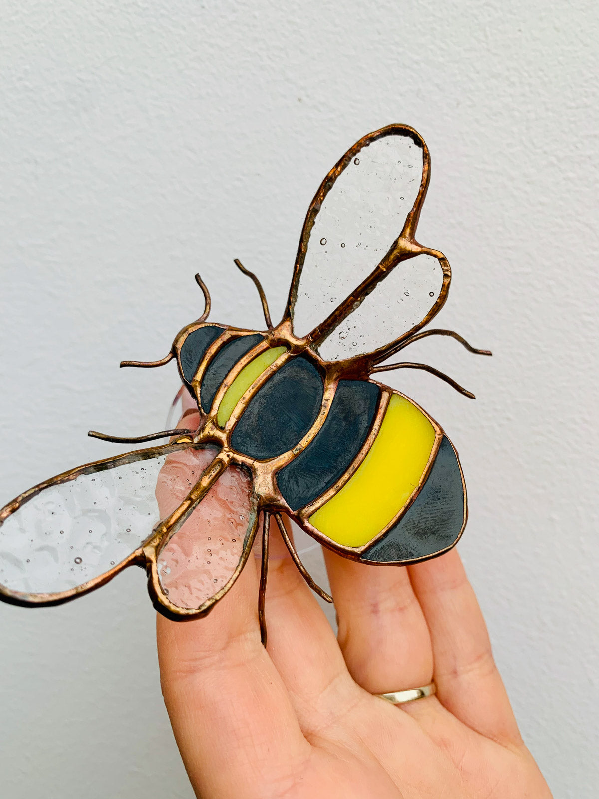 Bee with a suction cup