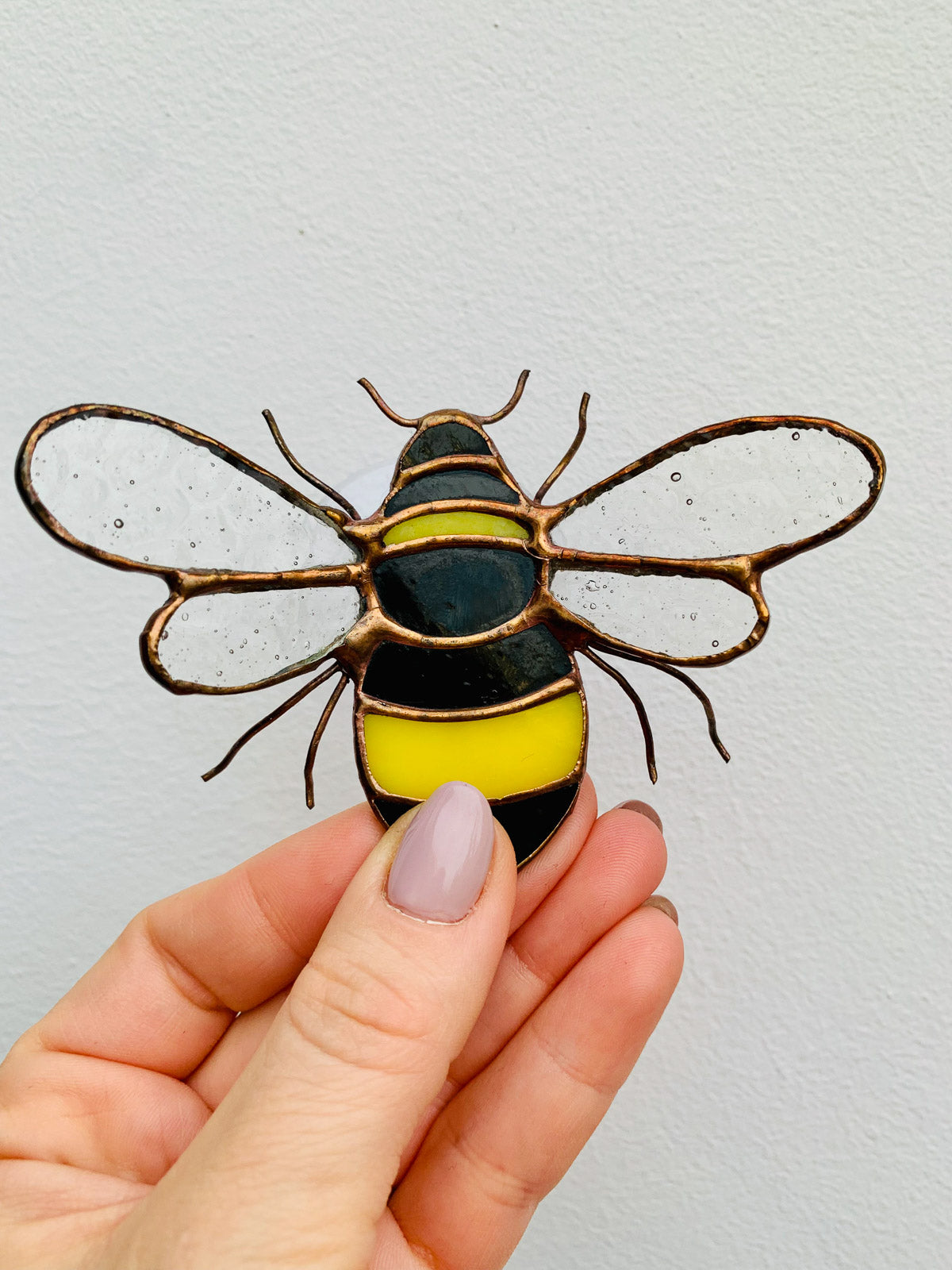 Bee with a suction cup